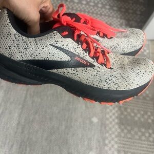 Brooks Black and White Running Shoes with Red Accents